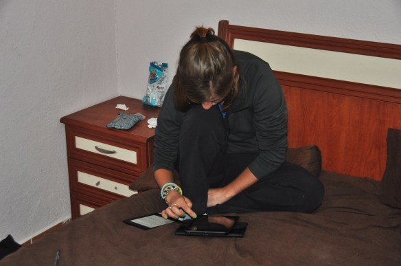 Reading my kindle as I update the blog. I've read over 2,500 pages in the last three weeks, so Kevin is really regretting the fact that he bought it for me!