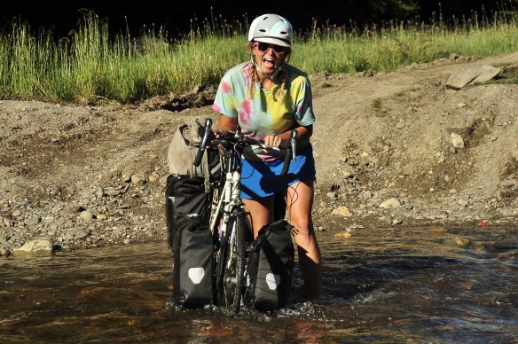 Emily crossing a stream to get to our camping site.