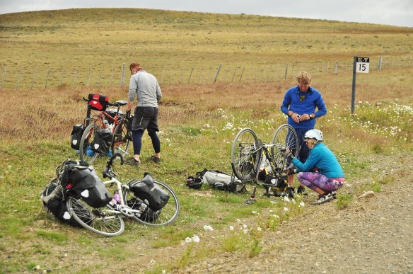 Bike maintenance at the side of the road.