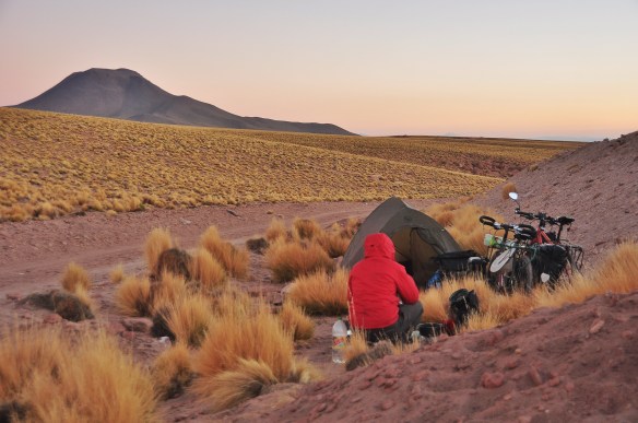 Kevin eating dinner at sunset.