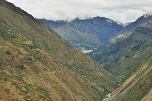 You can see our road to the left, carved out of the hillside.