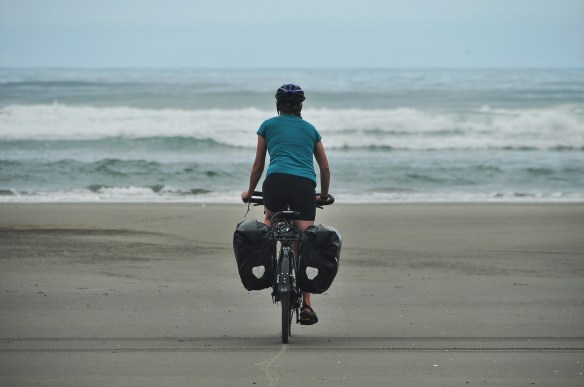 Riding to the ocean! Since it was low tide the beach had a large compacted section which made for nice riding.