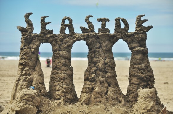 Part of a detailed sand sculpture on the beach in the town of Seaside.  