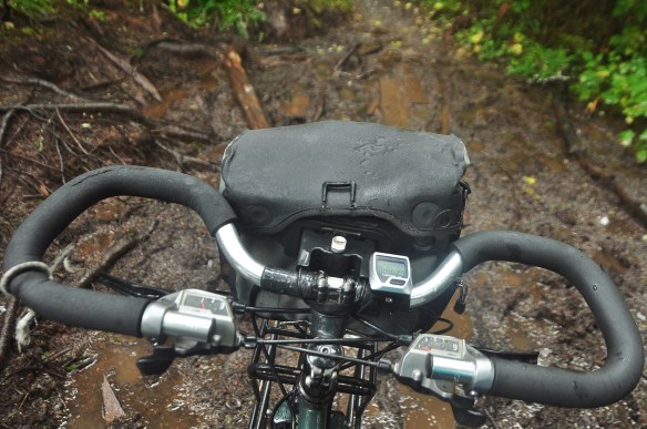 Cycling through the mud.